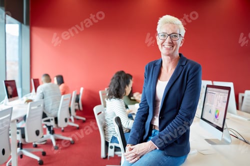 Preview: University students working at computer in class