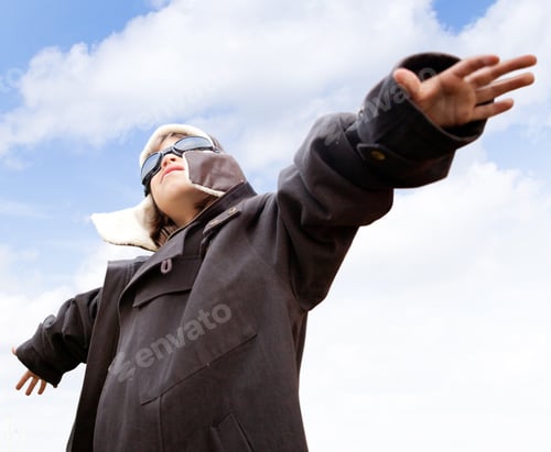 Preview: Young Kid Dreaming Of Being A Pilot Looking At The Sky
