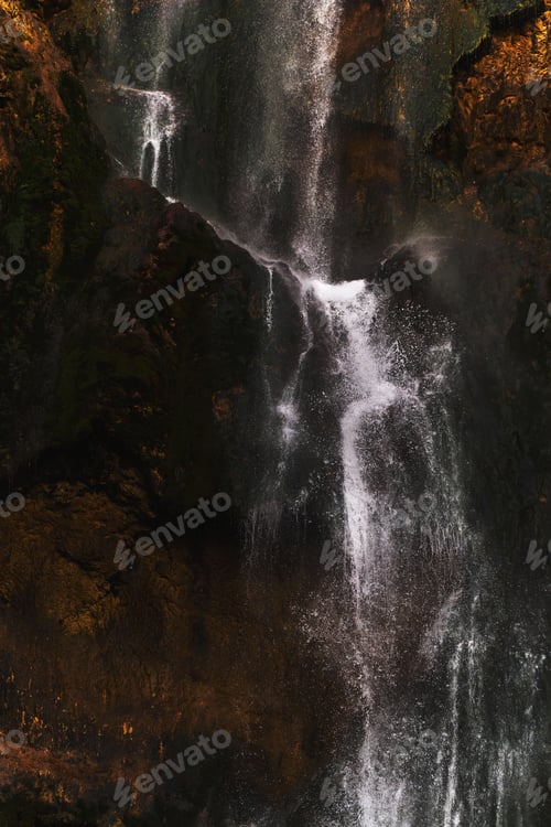 Preview: Grand waterfall cascading down a cliff