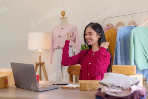 Preview: A young woman celebrates her success in her online clothing business.