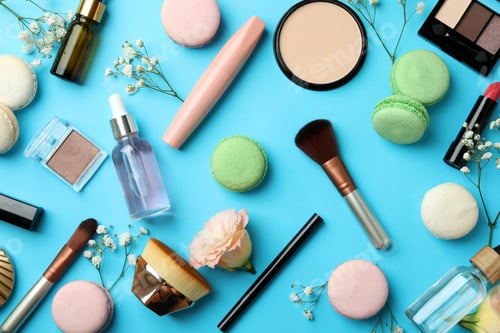 Preview: Female accessories and macaroons on blue background