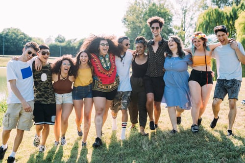 Preview: Group of friends dancing in park