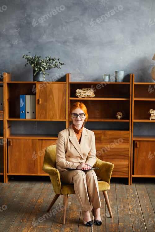 Preview: Mature businesswoman at her office