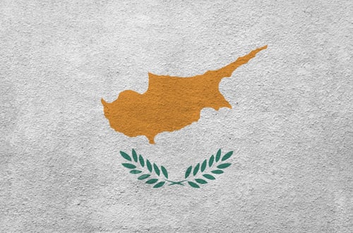 Preview: Cyprus flag depicted in bright paint colors on old relief plastering wall close up
