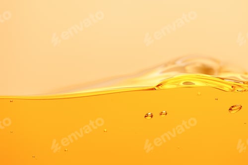 Preview: wavy yellow bright liquid with splash and bubbles isolated on yellow