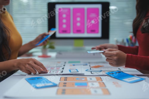 Preview: Ux designers working on wireframes for mobile application development
