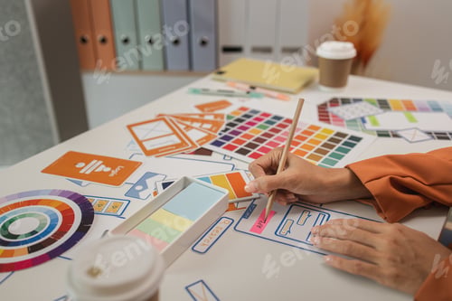 Preview: UI UX designers team working on new website wireframe in office