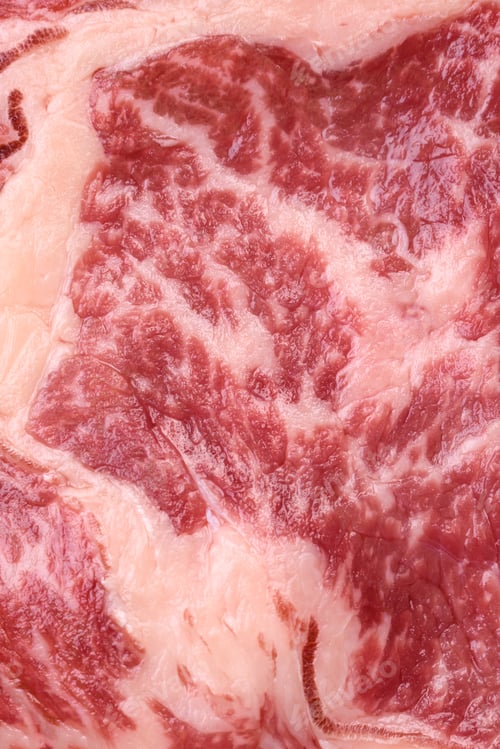 Preview: Fresh juicy raw beef striploin steak with salt and spices