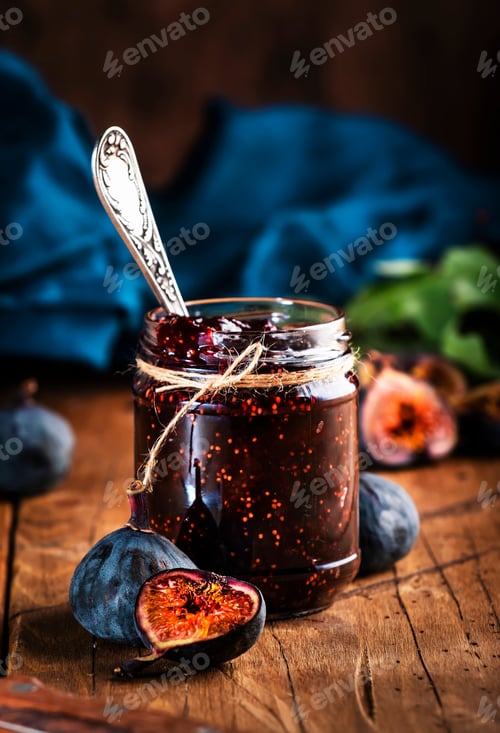 Preview: Red fig jam in jar with fresh blue figs