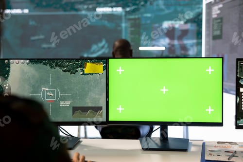 Preview: Army specialist examines satellite CCTV surveillance and copy space display