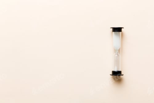 Preview: hourglass on the table, sand clock as time passing concept for business deadline, copy space