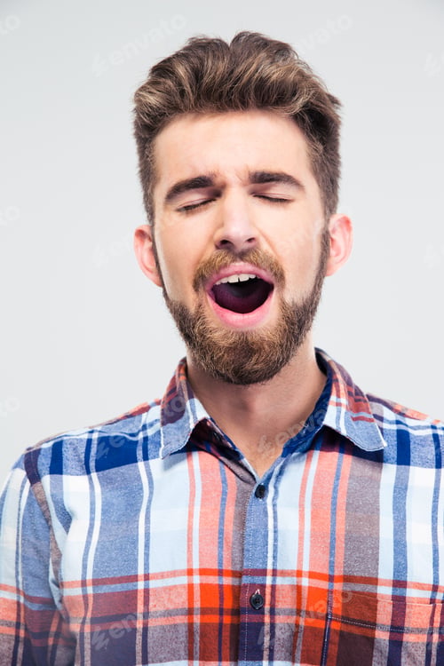 Preview: Portrait Of A Young Man Singing With Closed Eyes Isolated On A White Background
