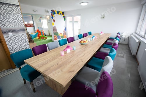 Preview: Wide shot of an empty dining area at a daycare center