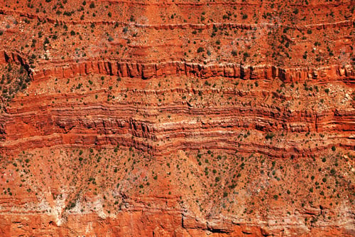 Preview: Beautiful landscape of layered bands of red rock revealing millions of years of geological history