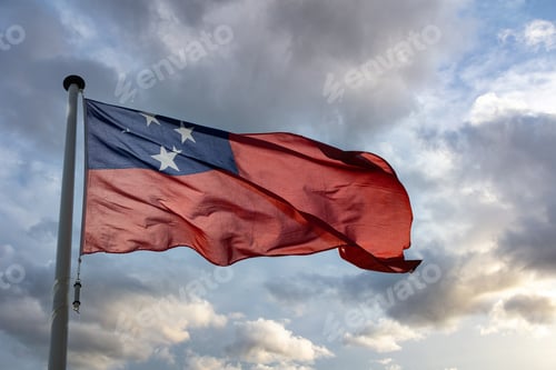 Preview: Waving Flag Against a Cloudy Sky Background
