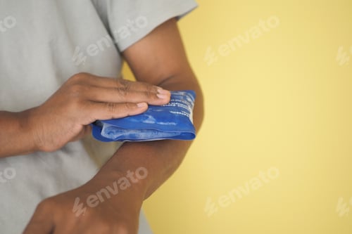 Preview: Applying a cold pack for arm injury relief