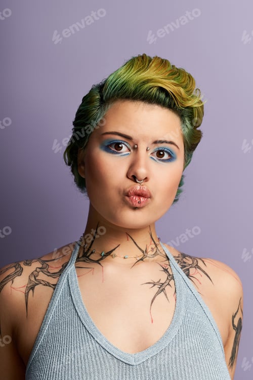 Preview: Young vibrant woman showcasing edgy fashion and artistic flair in a bold makeup look