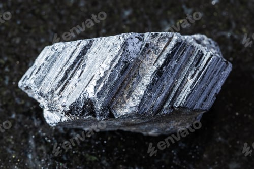 Preview: sample of raw tourmaline schorl mineral on black
