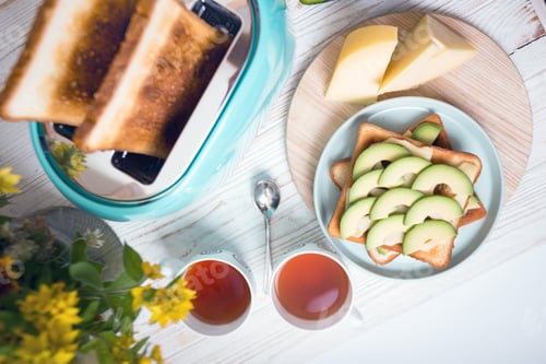 Preview: cyan color toaster on a wooden background