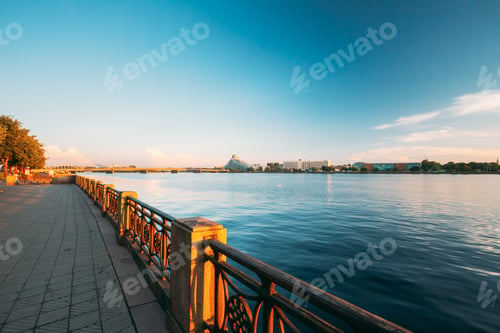 Preview: Riga Latvia. City promenade near Daugava River, National Library Building And Hotel Radisson Blu At