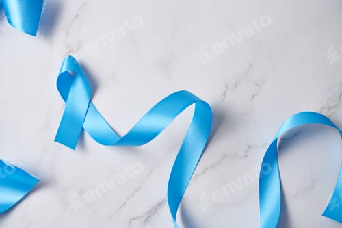 Preview: Prostate Cancer Awareness month, adult Man holding light Blue Ribbon