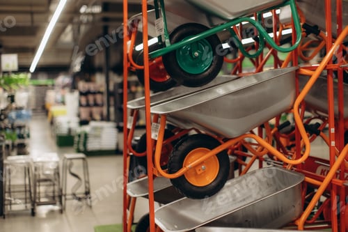 Preview: Row of Wheelbarrows Displayed in Hardware Store Aisle Interior