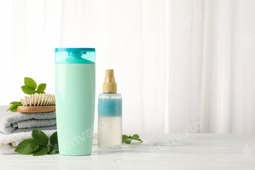 Preview: Shampoo and Hair Products on White Wooden Table