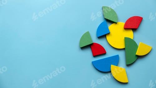 Preview: Colorful wooden pie chart pieces. Banner with copy space.