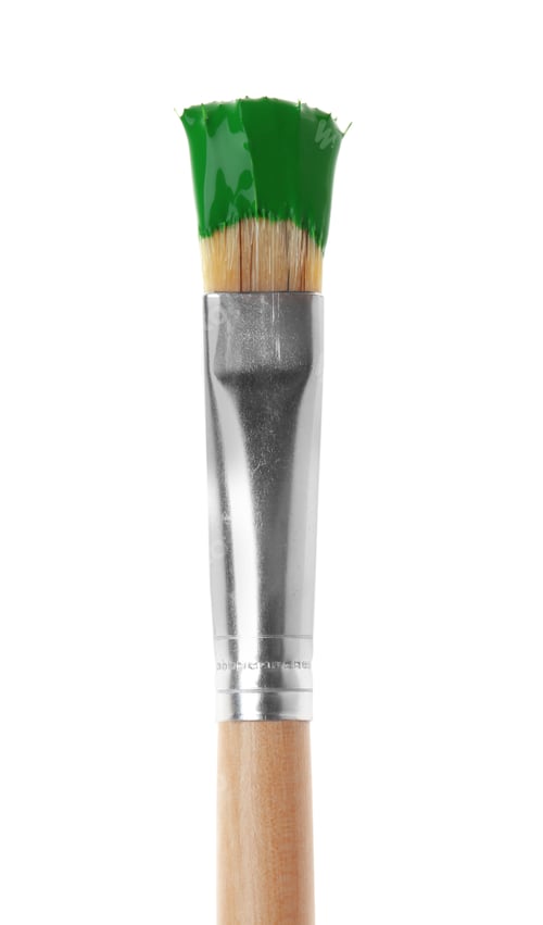 Preview: Brush with green paint on white background