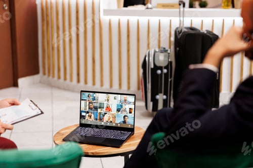 Preview: People attend business meeting in lobby