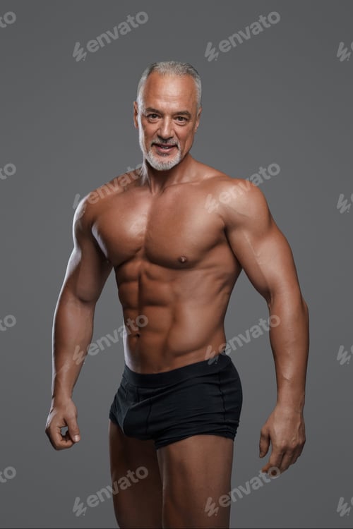 Preview: Charming mature muscular male model with stylish gray beard