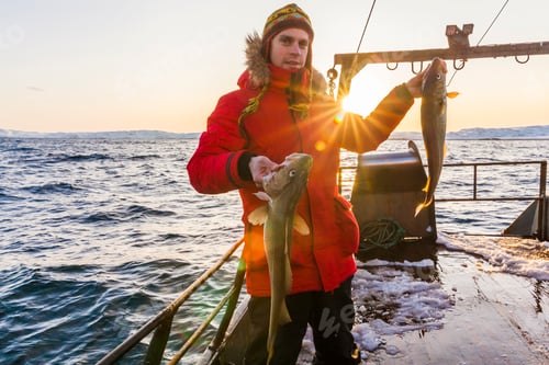 Preview: Fisherman on boat with in winter