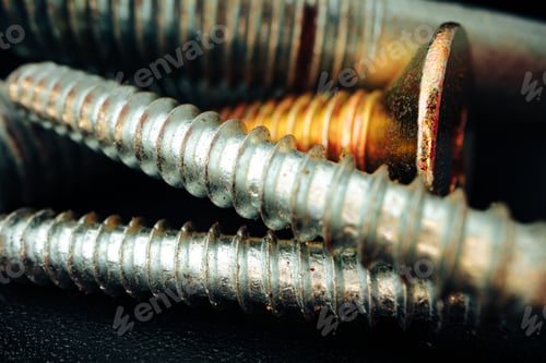 Preview: Iron screw bolts on black background close up