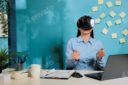 Preview: Professional woman with virtual reality glasses at office