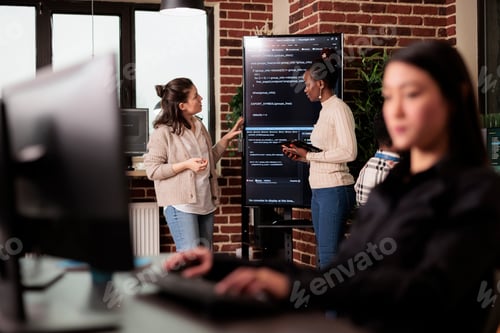 Preview: Diverse tech enginners talking about algorithms