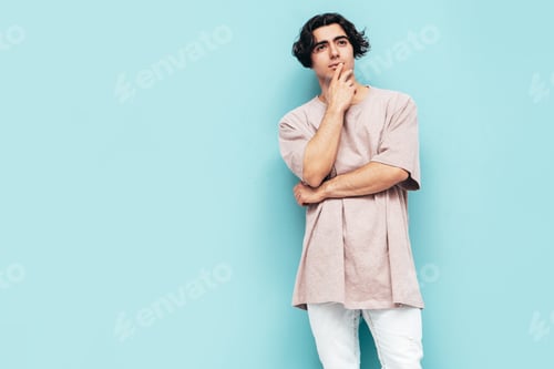 Preview: Handsome stylish man posing in studio