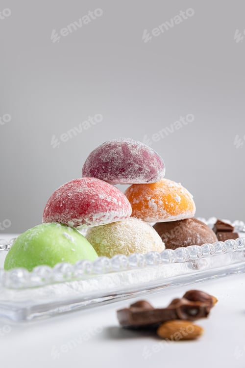 Preview: Plate of traditional Japanese mochi dessert served with nuts