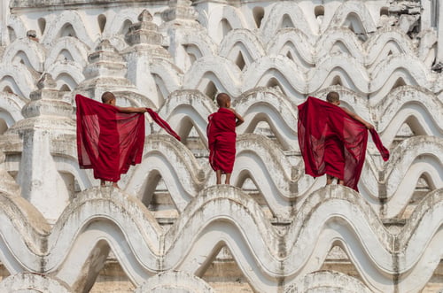 Preview: Back side of three young monk change the robe on the Mya Thein Tan Pagoda at bagan