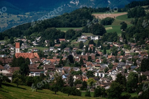 Preview: Summer view of a beautiful apline village in Switzerland
