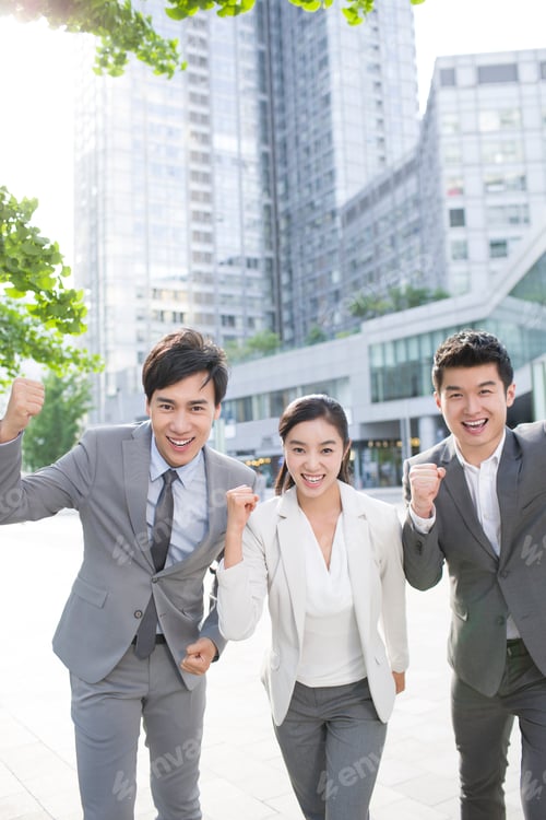 Preview: Young business person cheering