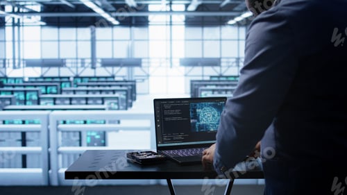 Preview: Engineer in server hub works with artificial intelligence computerized model