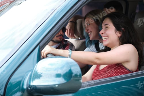 Preview: Group of friends travel together driving a car and making fun.
