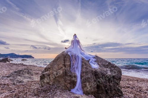 Preview: bride on a tropical beach at sunset