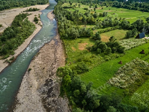 Preview: Aerial view of mountain river stream with stones valley landscape, Ukraine