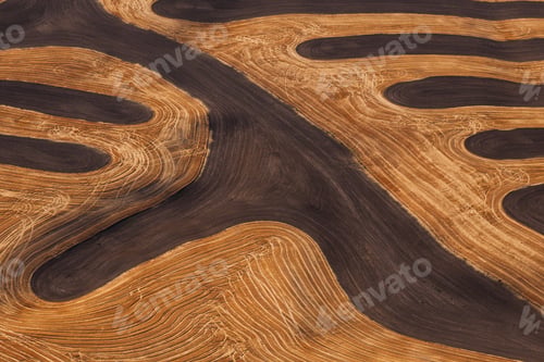 Preview: Farmland landscape, with ploughed fields and furrows, aerial view with natural patterns