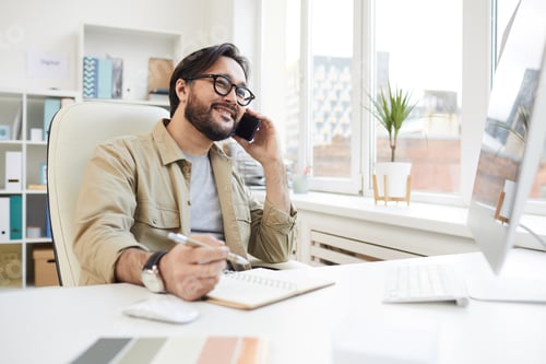 Preview: Communicative man calling customer
