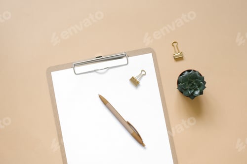 Preview: Workplace top view. Office supplies on a beige background