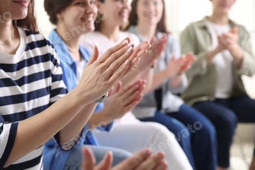 Preview: People applauding during meeting indoors, closeup view
