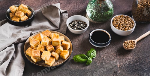 Preview: Deep fried vegetarian soy tofu cheese on plate on table web banner