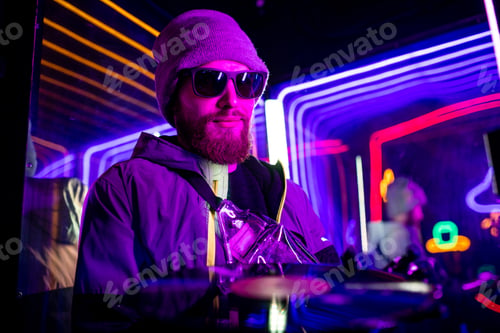 Preview: robotics dj man with metal hand nostalgia about past time in neon studio feeling loneliness